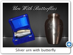 Silver urn with butterfly