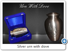 Silver urn with dove